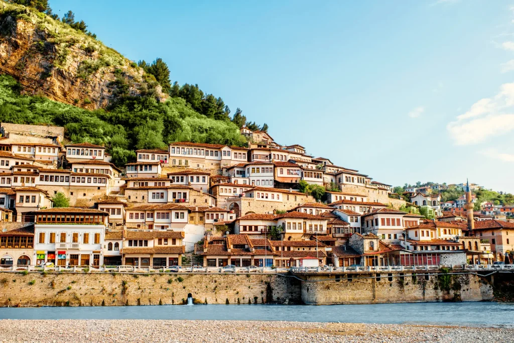 View of Berat's white Ottoman houses stacked on the hillside above the Osum River, Albania